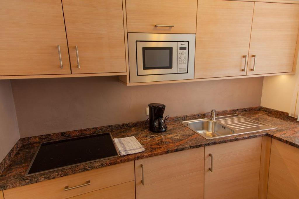 Kuchyň nebo kuchyňský kout v ubytování Residence Armonia