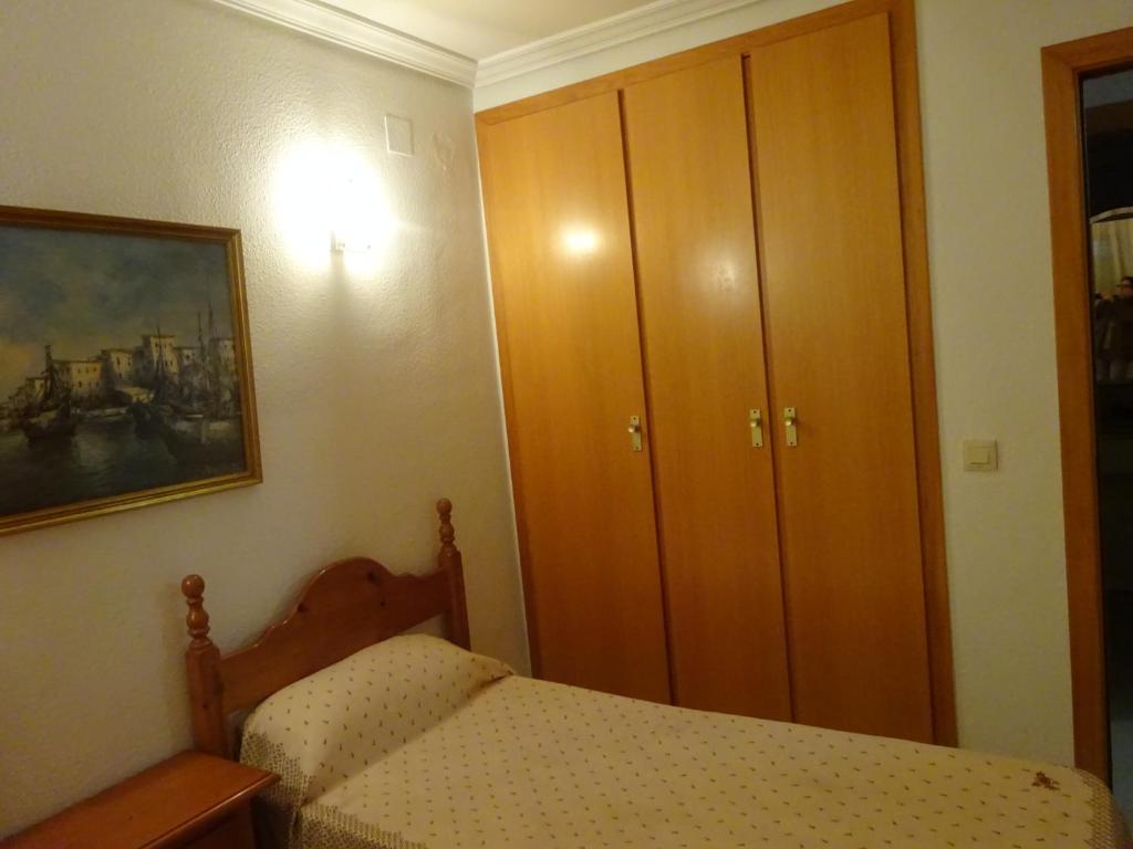 Posteľ alebo postele v izbe v ubytovaní turquesa