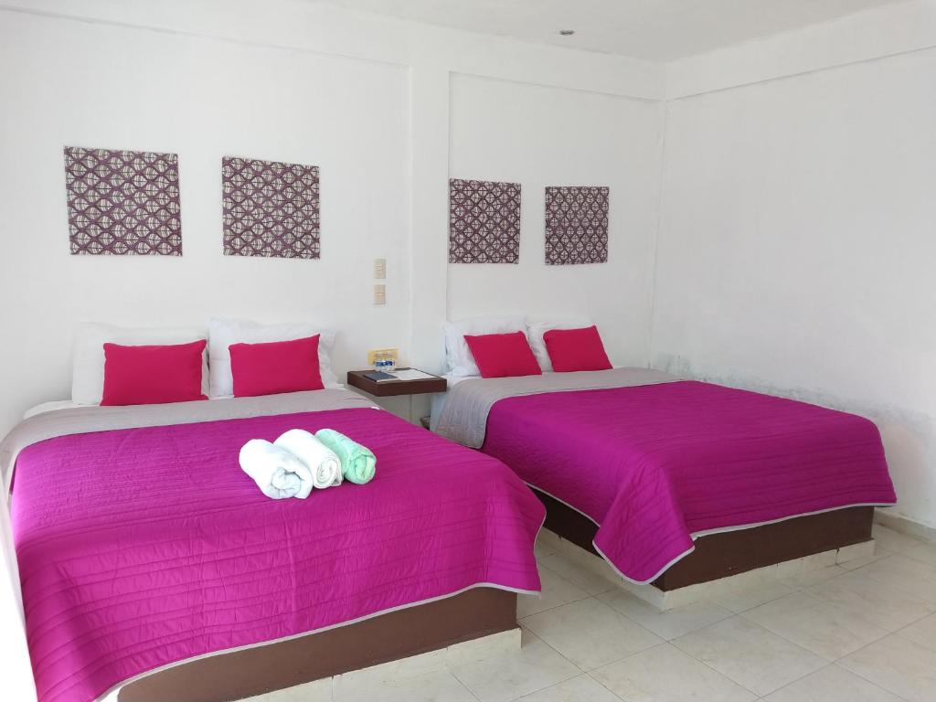 Postel nebo postele na pokoji v ubytování Hotel España