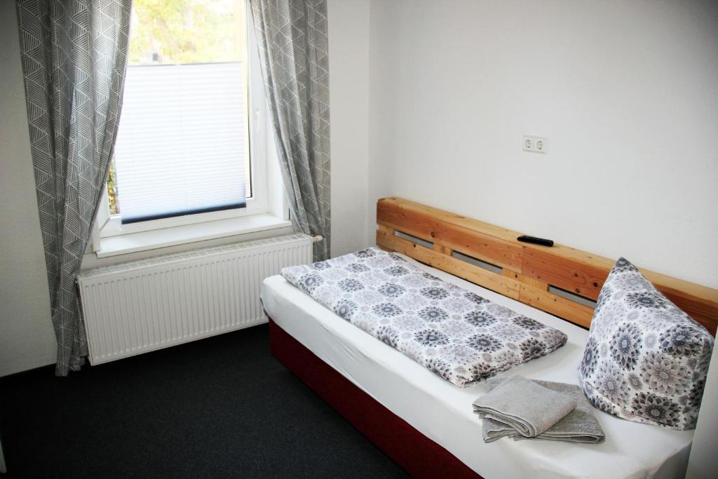 Postel nebo postele na pokoji v ubytování Botschaft