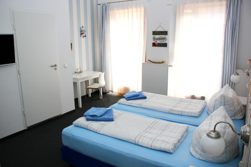 Postel nebo postele na pokoji v ubytování Botschaft