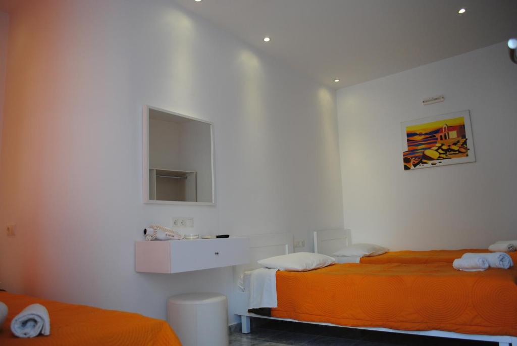 Postel nebo postele na pokoji v ubytování Hotel Milena