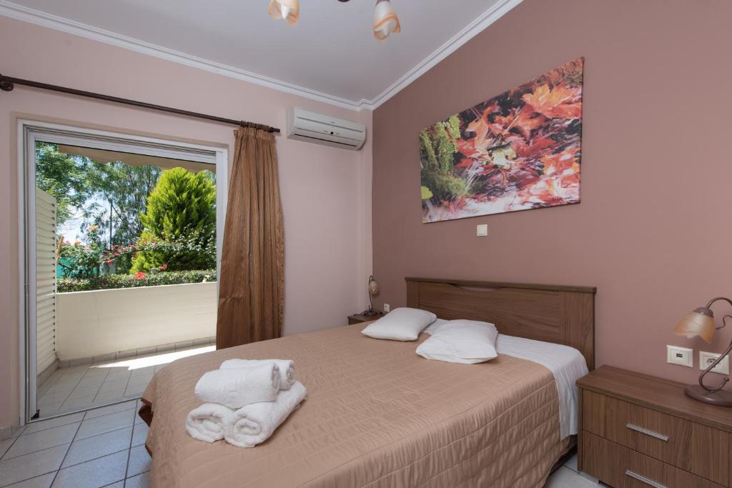 Postel nebo postele na pokoji v ubytování Sun Rise Hotel Apartments