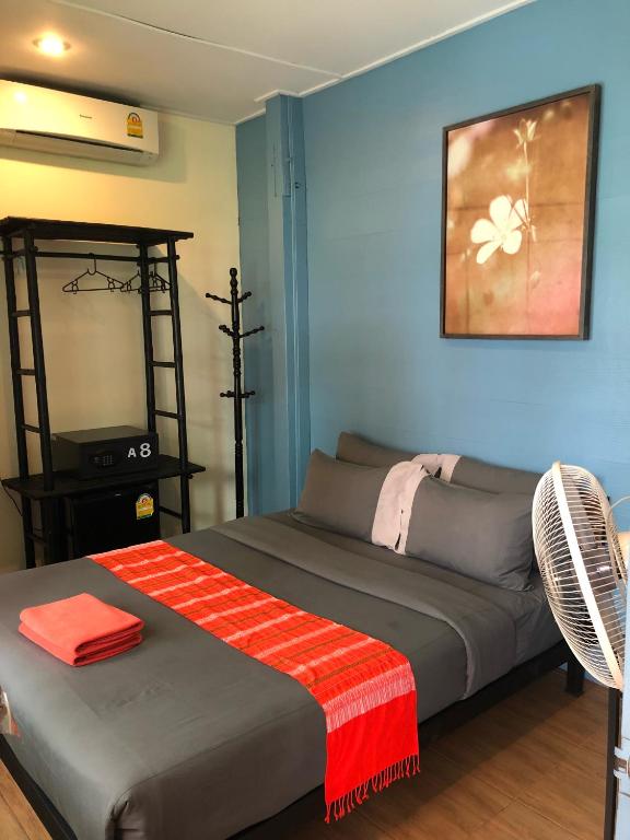 Postel nebo postele na pokoji v ubytování Blue Chang House