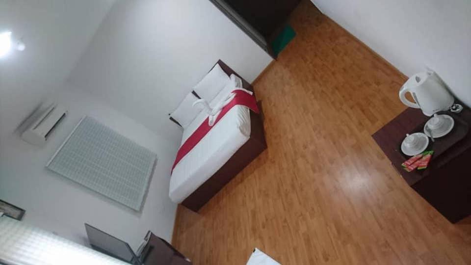 Postel nebo postele na pokoji v ubytování Hotel Mill Road