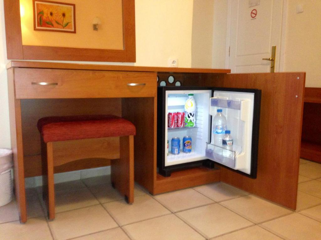 TV a/nebo společenská místnost v ubytování Hotel Kronio