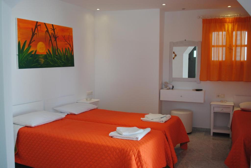 Postel nebo postele na pokoji v ubytování Hotel Milena