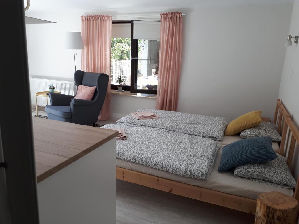 Postel nebo postele na pokoji v ubytování Das Tulpen Apartment