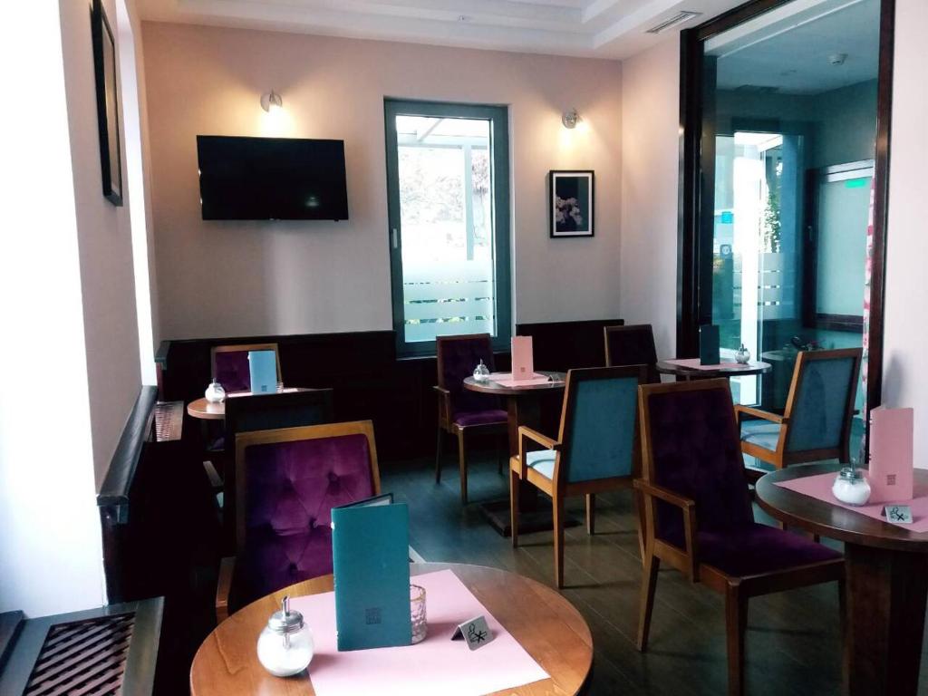 TV a/nebo společenská místnost v ubytování Hotel Royal Gold City