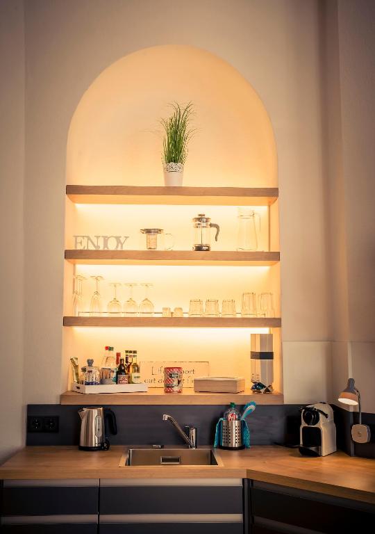 Kuchyň nebo kuchyňský kout v ubytování Schwerin City Apartment