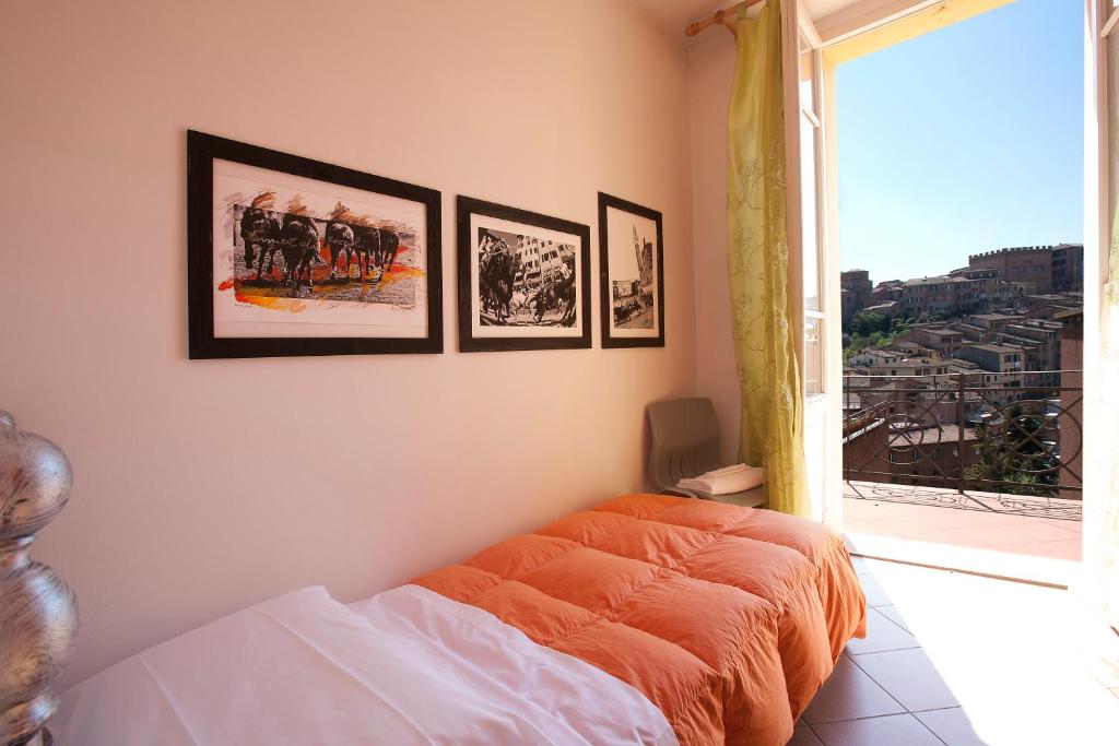 Posteľ alebo postele v izbe v ubytovaní B&B Le Lupe