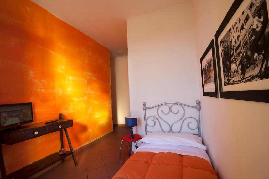 Posteľ alebo postele v izbe v ubytovaní B&B Le Lupe
