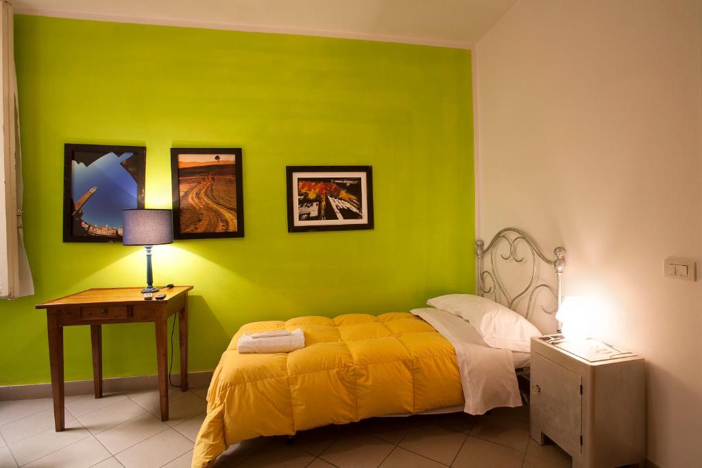 Posteľ alebo postele v izbe v ubytovaní B&B Le Lupe
