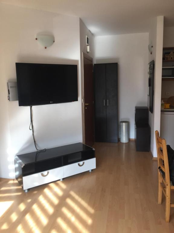 A television and/or entertainment centre at Blue Summer