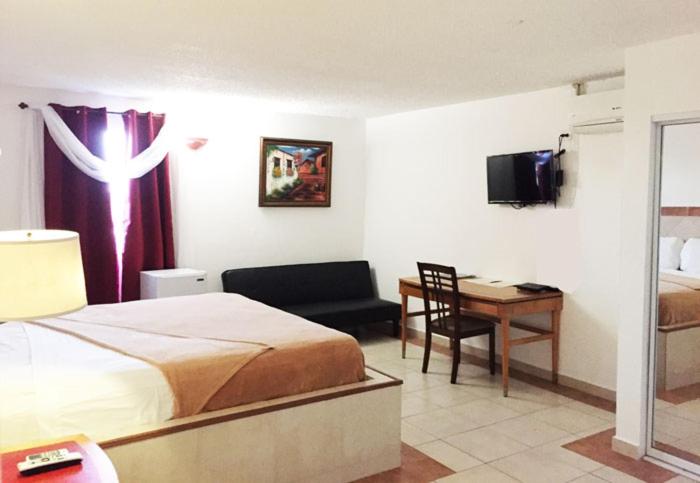 Postel nebo postele na pokoji v ubytování Levimar Guest House