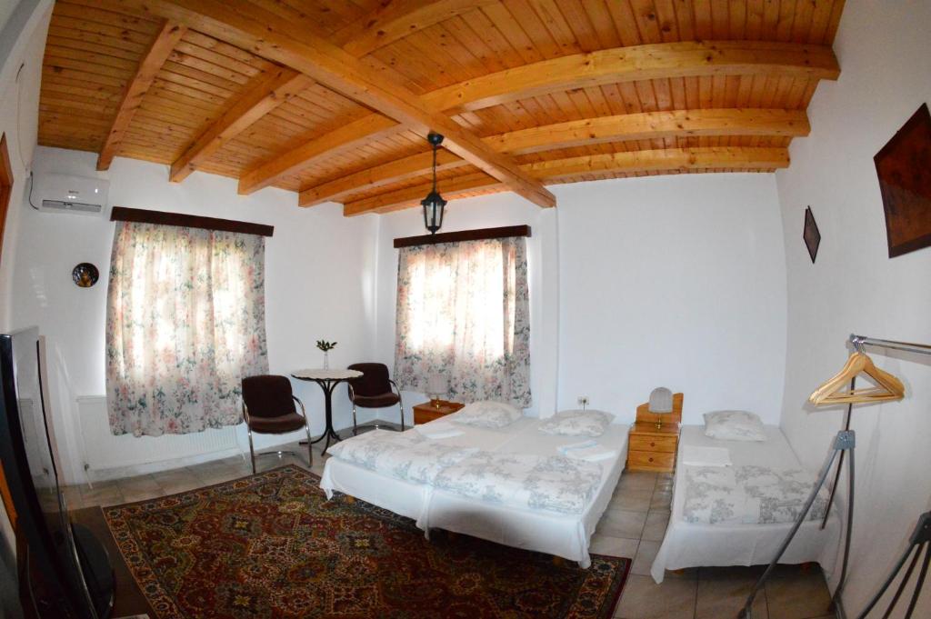 Postel nebo postele na pokoji v ubytování Casa Altius Felix