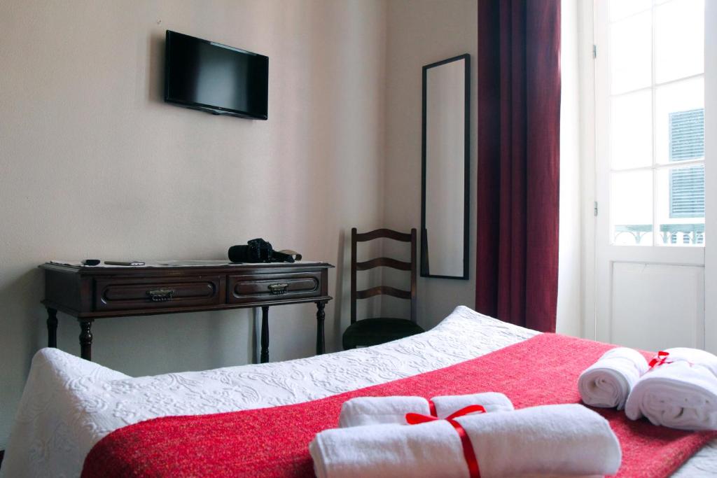 Postel nebo postele na pokoji v ubytování Hotel GORDON