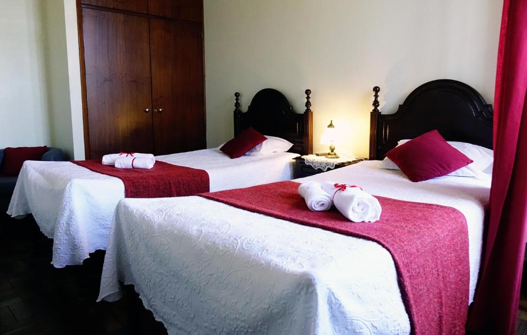 Postel nebo postele na pokoji v ubytování Hotel GORDON