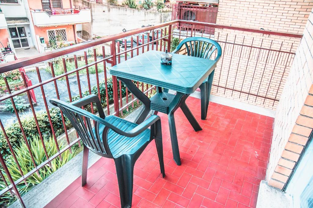 A balcony or terrace at La Fiaba Roma Apartment