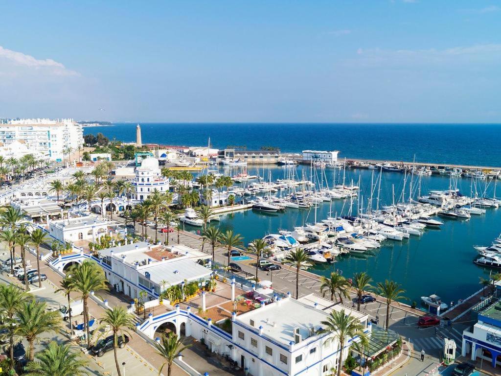 an aerial view of a marina with boats in the water at urbanización puerto paraiso in Estepona
