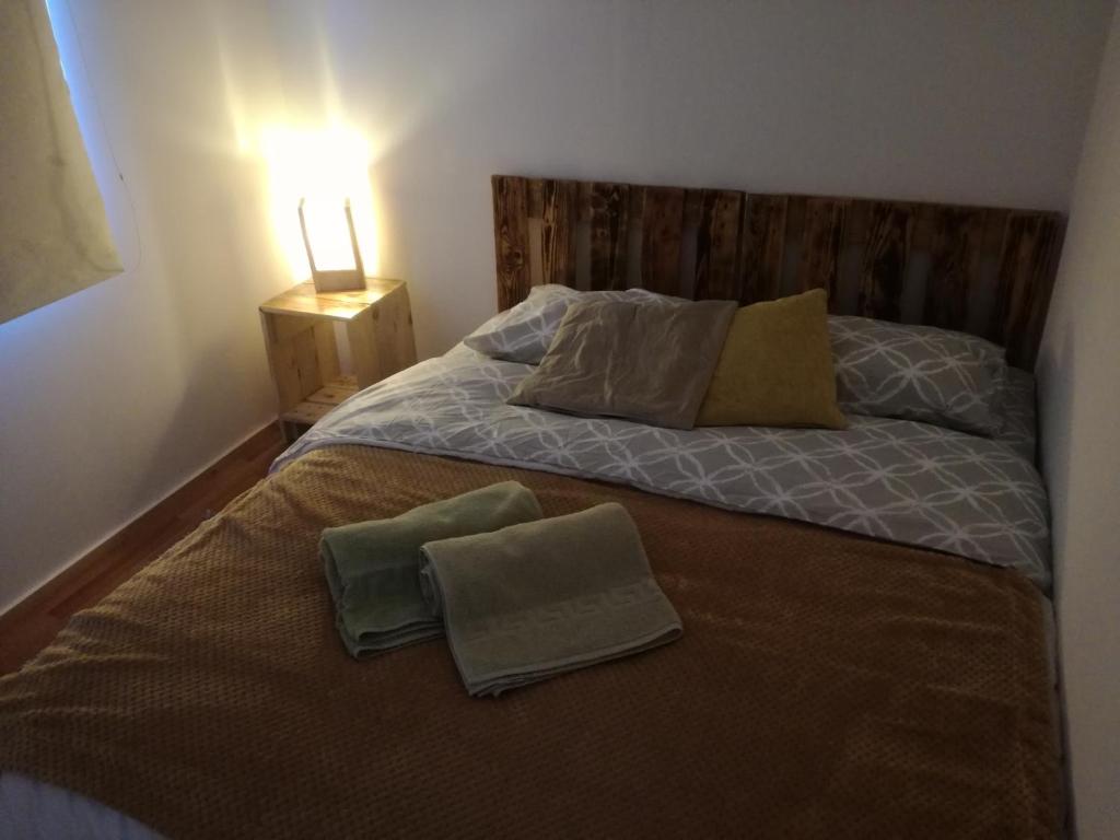 Postelja oz. postelje v sobi nastanitve Hostal Mi Paz