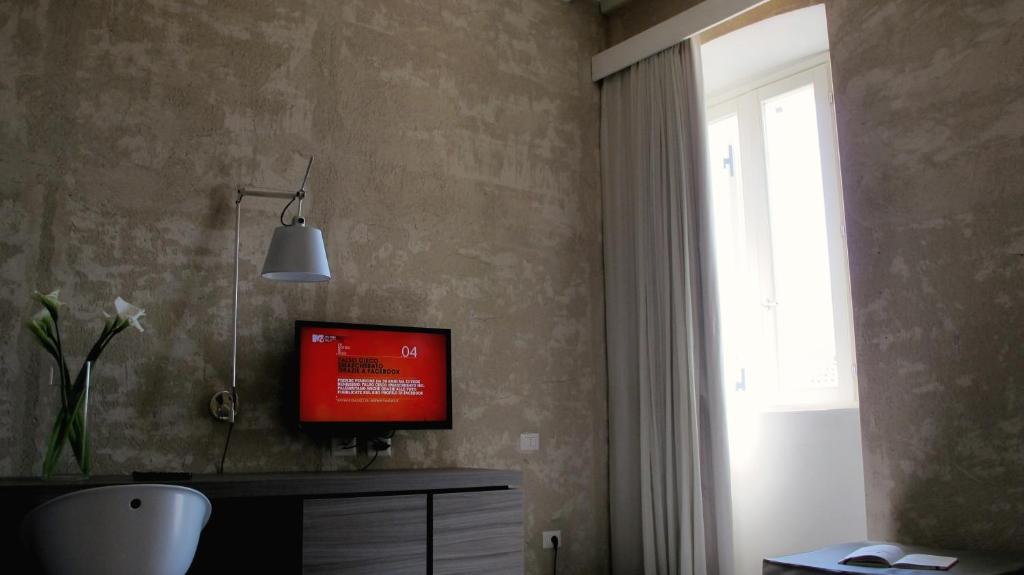 TV a/nebo společenská místnost v ubytování Hotel & Resort Le Colombare
