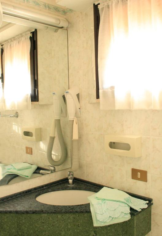 Koupelna v ubytování Hotel Aggravi