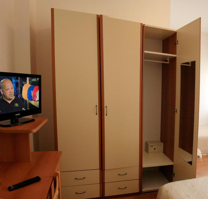 TV a/nebo společenská místnost v ubytování Hotel Aggravi