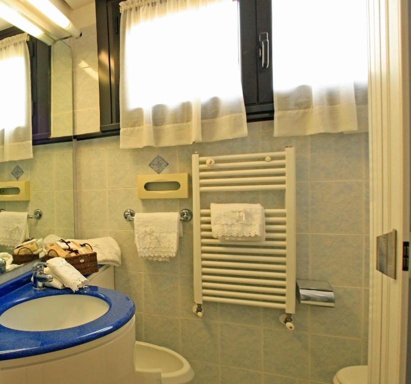 Koupelna v ubytování Hotel Aggravi