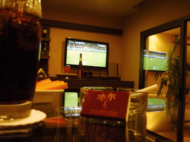 TV a/nebo společenská místnost v ubytování Orient Prince Hotel