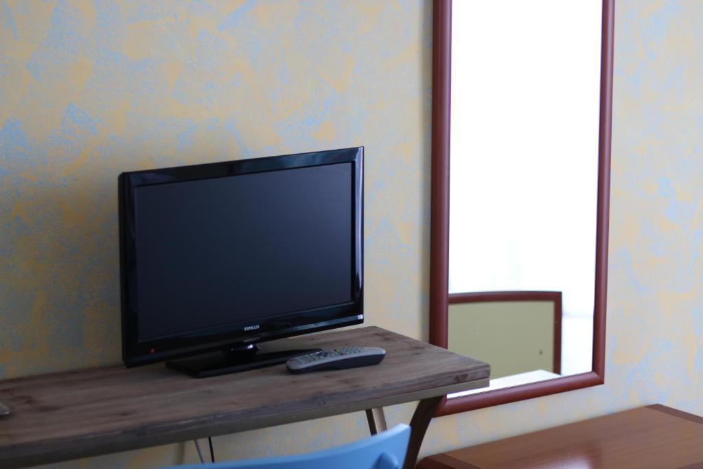 TV a/nebo společenská místnost v ubytování Vila Meteor
