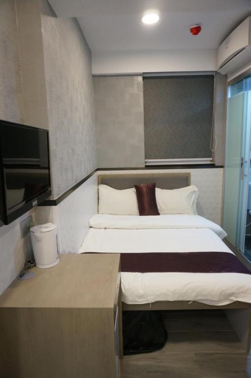 Katil atau katil-katil dalam bilik di Vve Vve Hotel