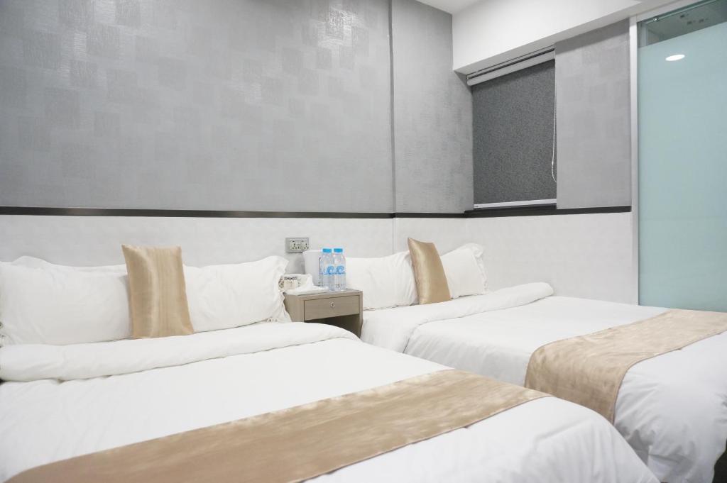 Katil atau katil-katil dalam bilik di Vve Vve Hotel