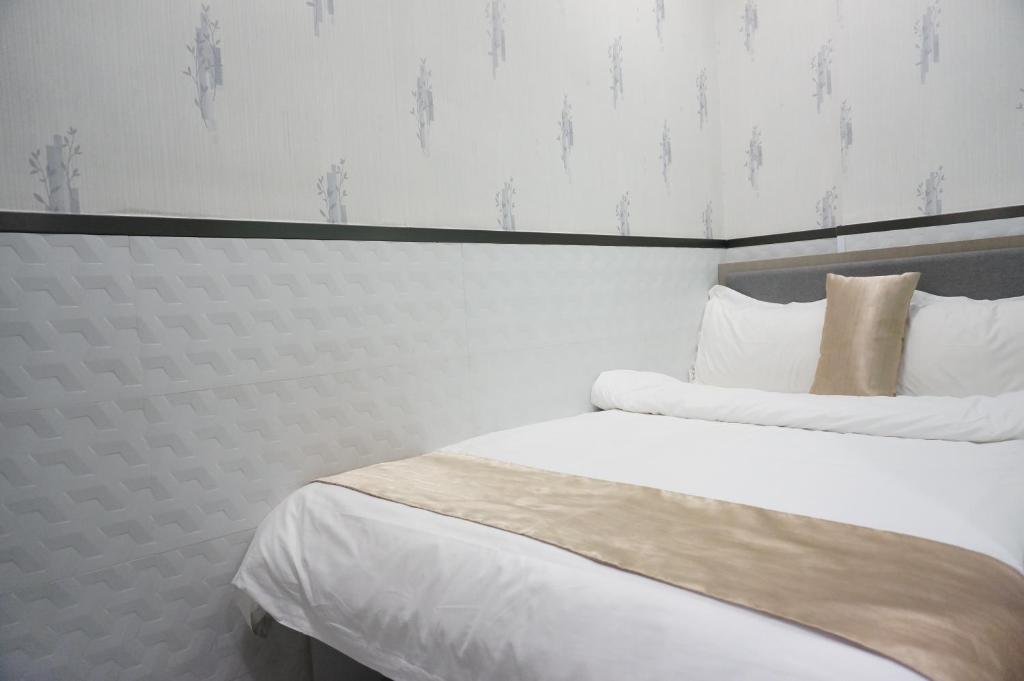 Katil atau katil-katil dalam bilik di Vve Vve Hotel