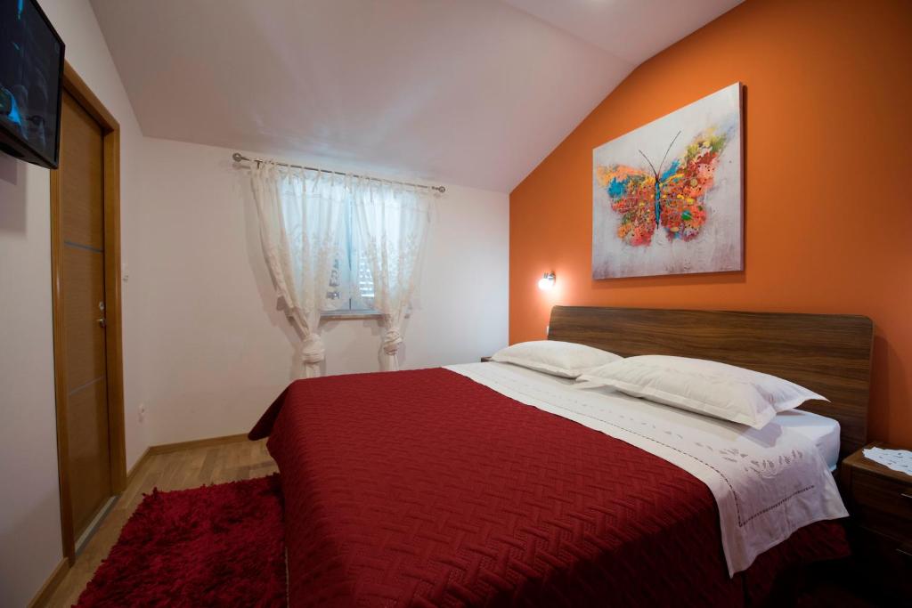 Postel nebo postele na pokoji v ubytování Villa Ivana