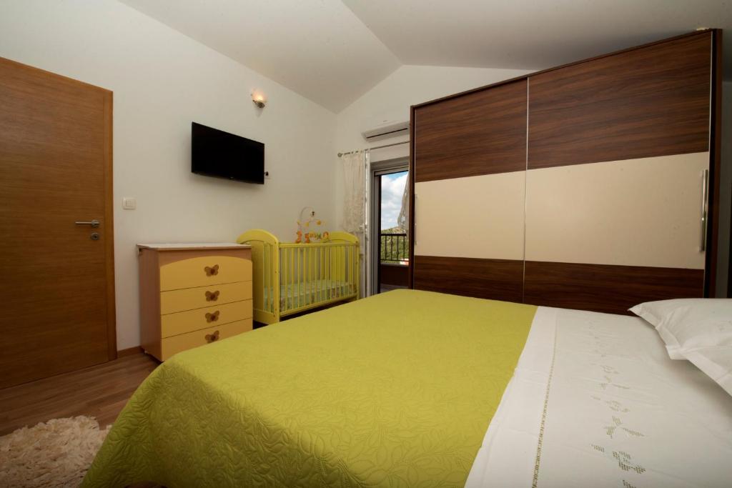 Postel nebo postele na pokoji v ubytování Villa Ivana