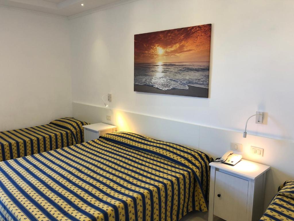 Postel nebo postele na pokoji v ubytování Hotel Bahamas