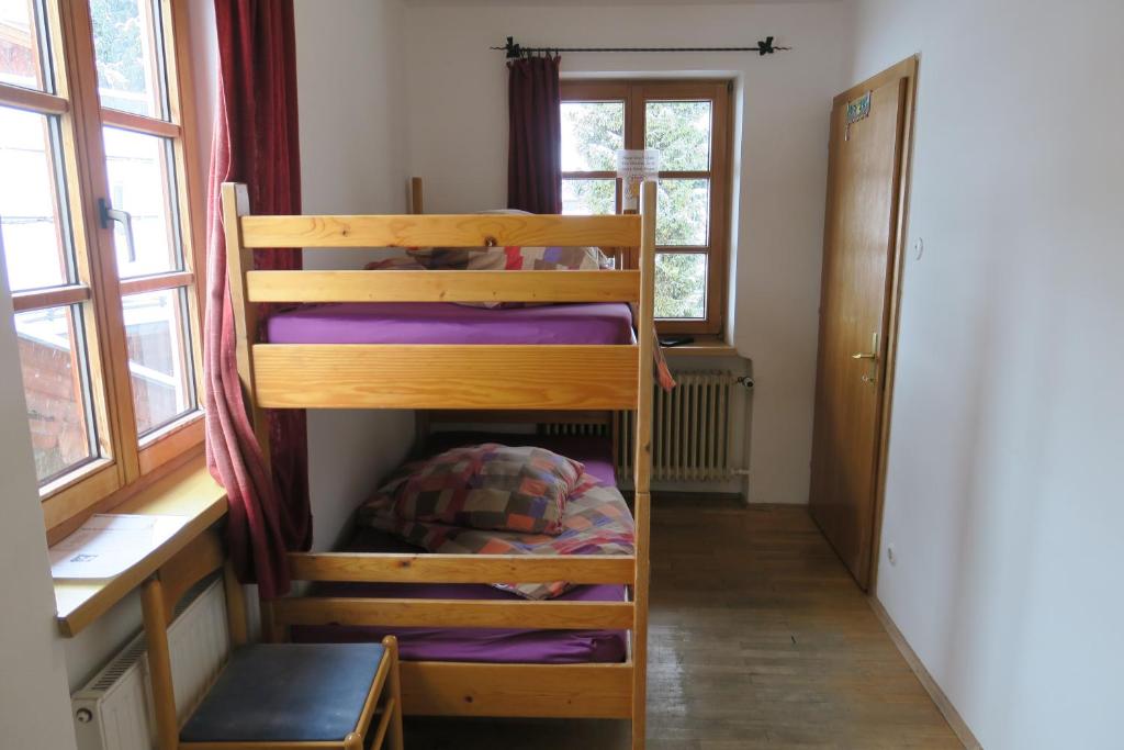 Postel nebo postele na pokoji v ubytování SnowBunnys BackPackers Hostel