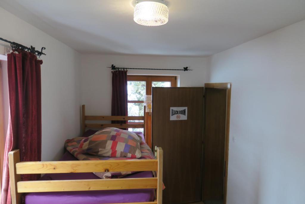 Postel nebo postele na pokoji v ubytování SnowBunnys BackPackers Hostel