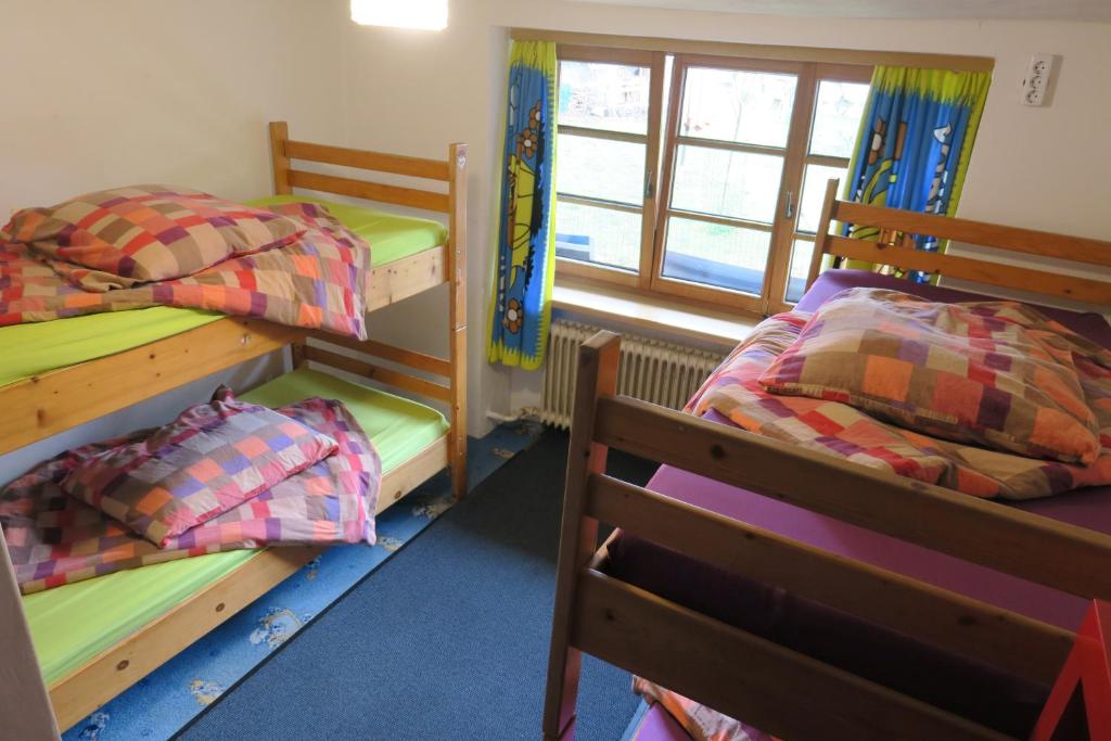 Postel nebo postele na pokoji v ubytování SnowBunnys BackPackers Hostel