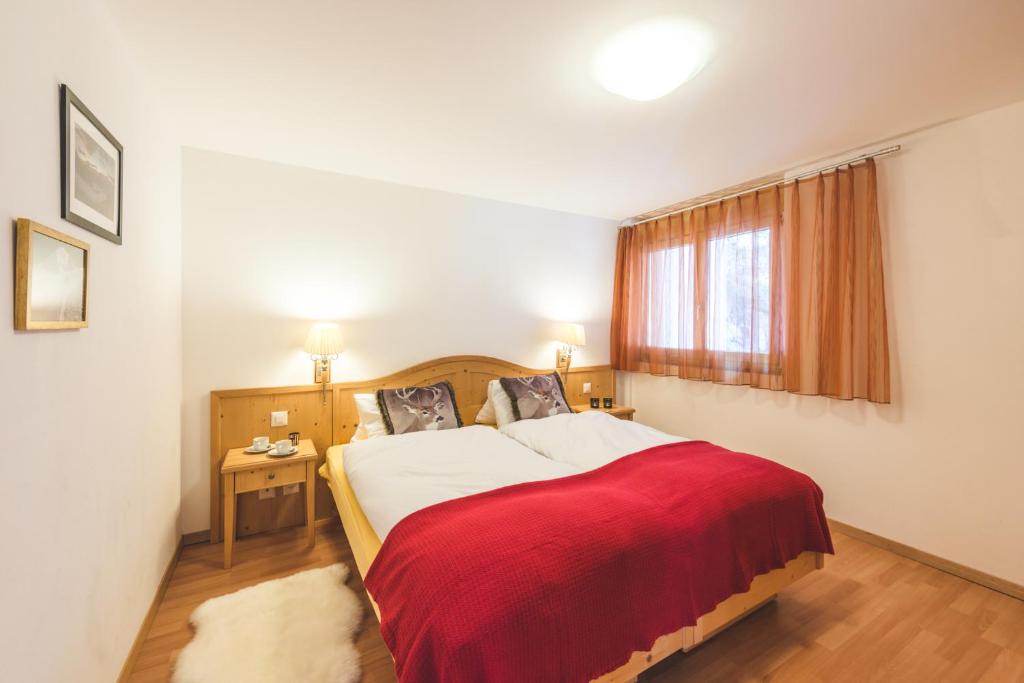Postel nebo postele na pokoji v ubytování Apartment Alpharmonie