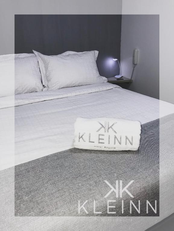 Postel nebo postele na pokoji v ubytování KLEINN HOTEL BOGOTÁ