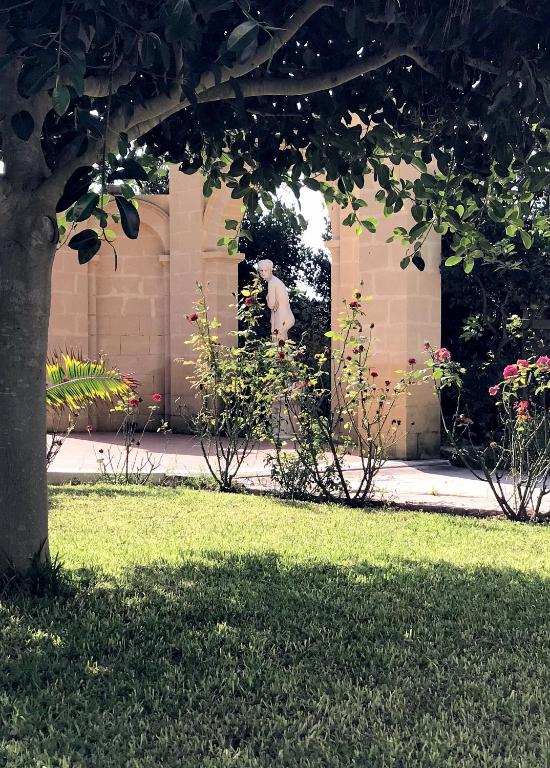 A garden outside VILLA MARRONE - Relais -