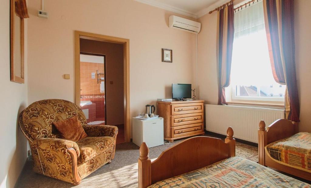TV a/nebo společenská místnost v ubytování Penzión Exclusive