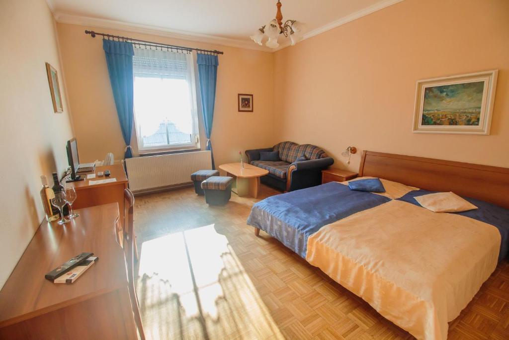 Postel nebo postele na pokoji v ubytování Penzión Exclusive