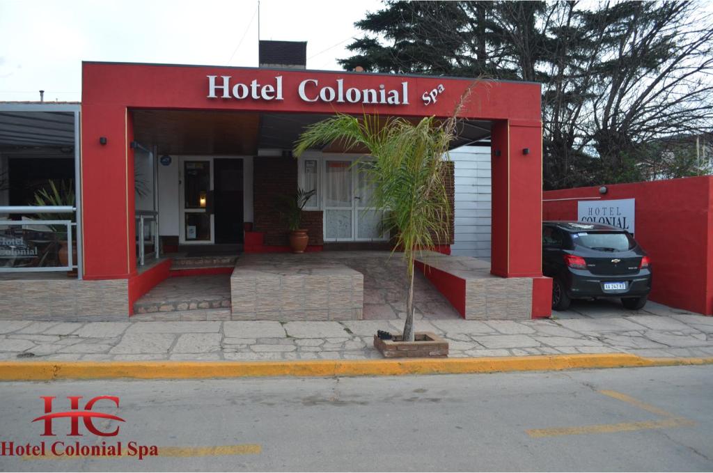 a hotel colonial sign in front of a building at HOTEL COLONIAL in Villa Carlos Paz