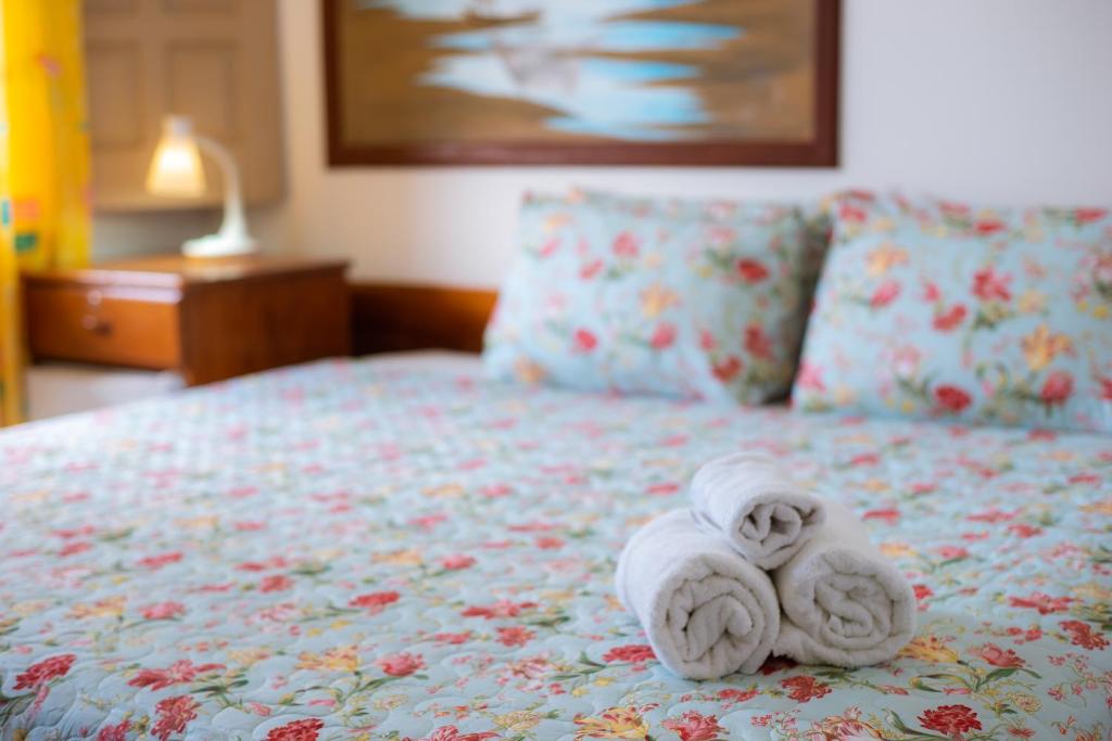 Cama ou camas em um quarto em Brisa do Caitá Praia Hotel