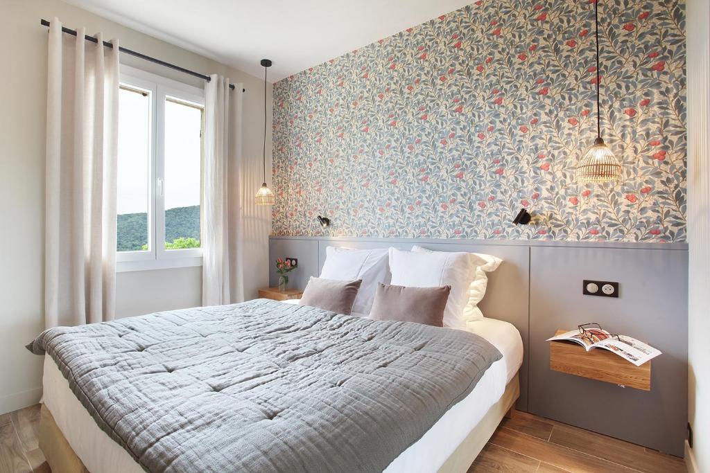 Postel nebo postele na pokoji v ubytování Hôtel de Charme Bello Visto
