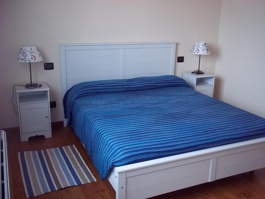 Postel nebo postele na pokoji v ubytování Agriturismo Vecchio Torchio