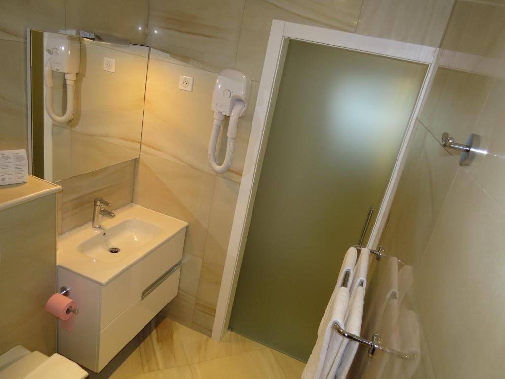 Koupelna v ubytování Hôtel Mare E Monti